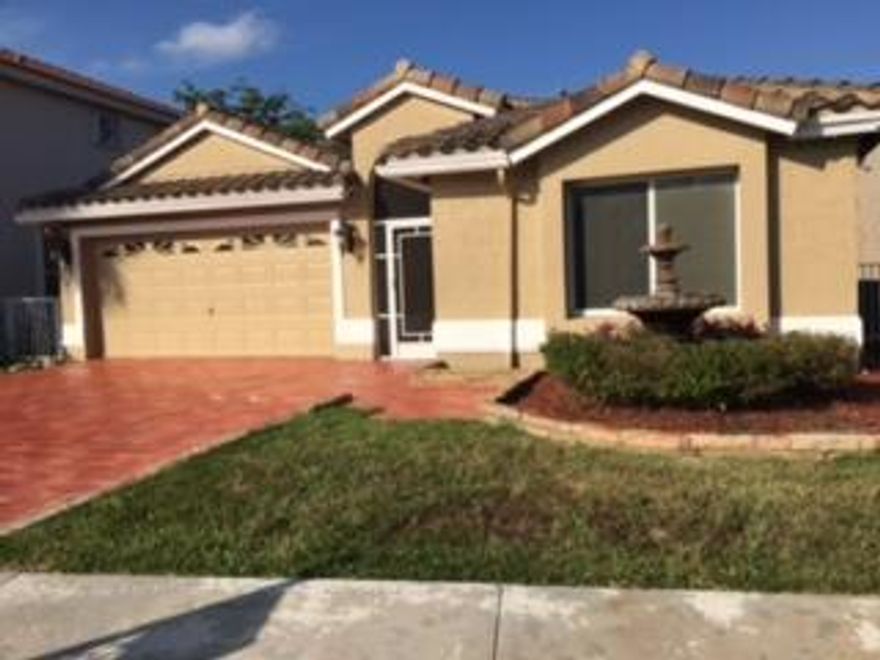 Nice size home with a great layout and floor plan. Large eat-in kitchen opens to the family room. Custom built in Entertainment Center, Bookshelves and Storage. Sliding doors open out onto covered Patio, Screened in Pool and Spa. Beautiful marble floors through-out. Large private master suite with private custom dressing area and access to pool. Separate laundry room off the master bedroom. Community has tennis courts and 2 pools. Roof 2006, AC 2009