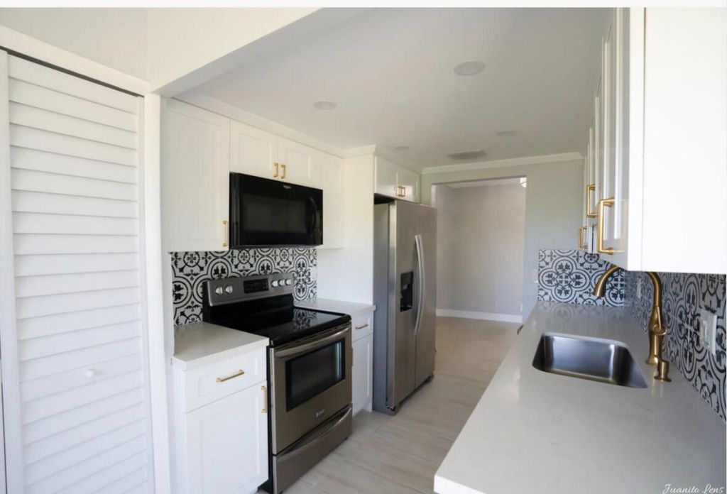 Photo of 8002 Lagos De Campo Boulevard #B306, Tamarac, FL 33321 (MLS # B26019080)