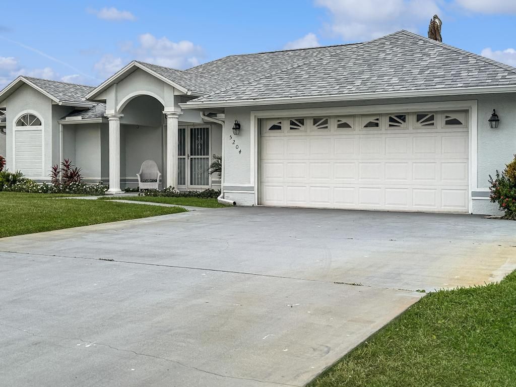 Photo of 5204 Feather Creek Drive, Fort Pierce, FL 34951 (MLS # R11154233)