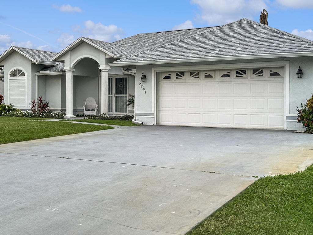 Photo of 5204 Feather Creek Drive, Fort Pierce, FL 34951 (MLS # R11154233)