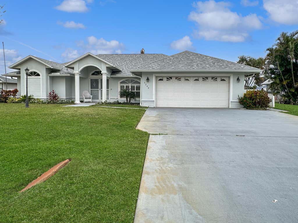 Photo of 5204 Feather Creek Drive, Fort Pierce, FL 34951 (MLS # R11154233)
