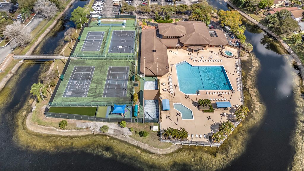 Photo of 3630 NW 23rd Place, Coconut Creek, FL 33066 (MLS # B26000326)