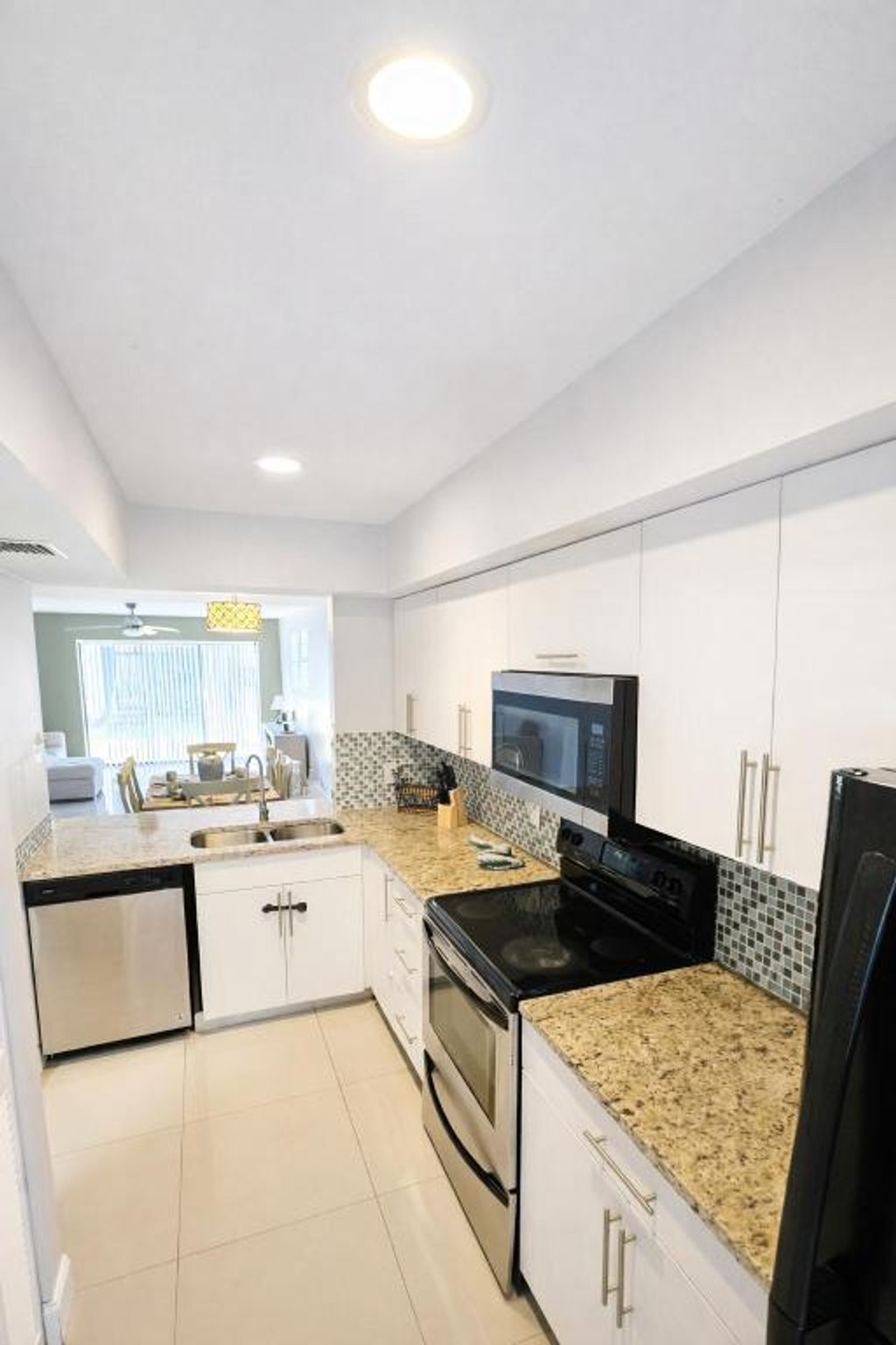Photo of 11596 NW 45th Street #4, Coral Springs, FL 33065 (MLS # R11157737)