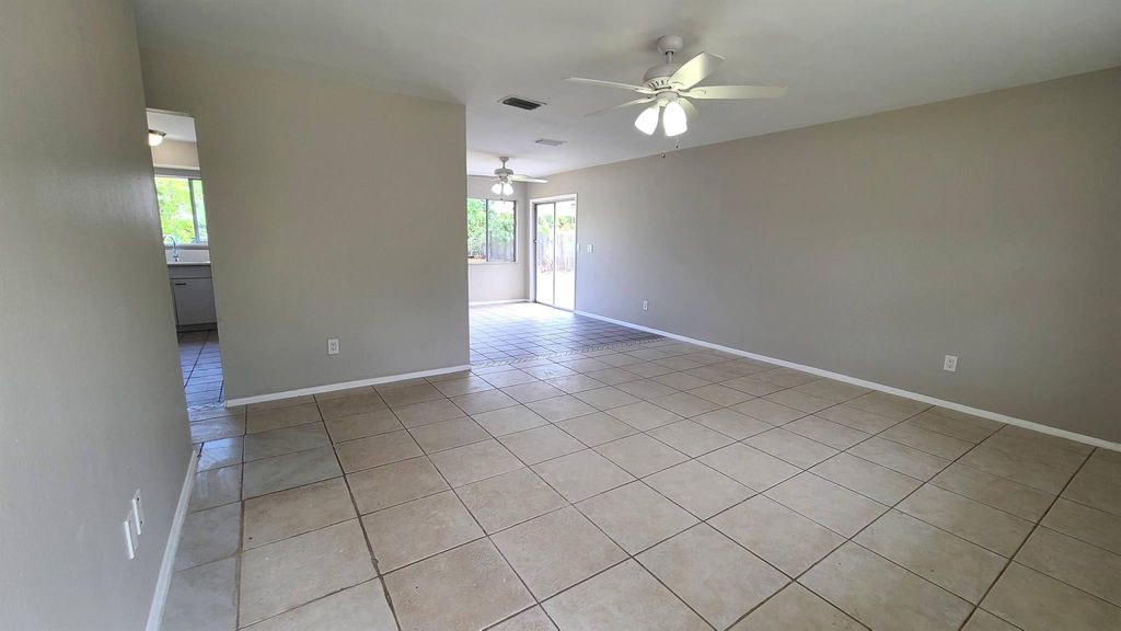 Photo of 317 SE Dalva Avenue, Port Saint Lucie, FL 34984 (MLS # R10983221)