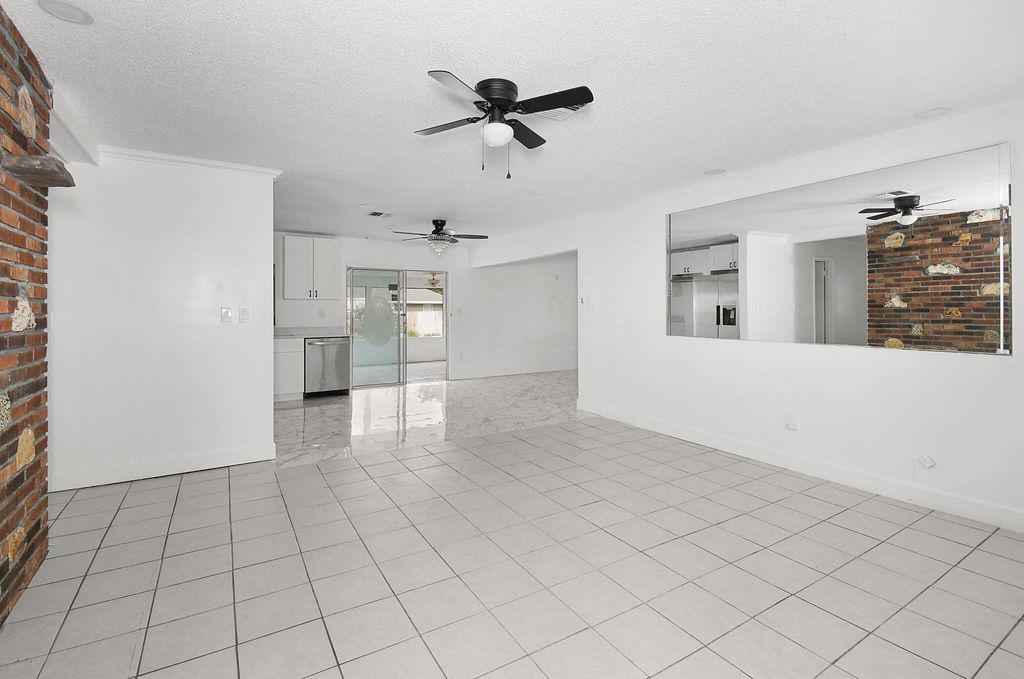 Photo of 325 NW Rebecca Avenue, Port Saint Lucie, FL 34983 (MLS # B26014074)