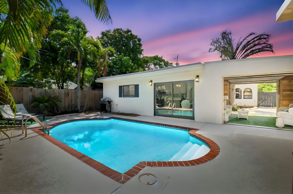 Photo of 705 Colonial Road, West Palm Beach, FL 33405 (MLS # R11158993)