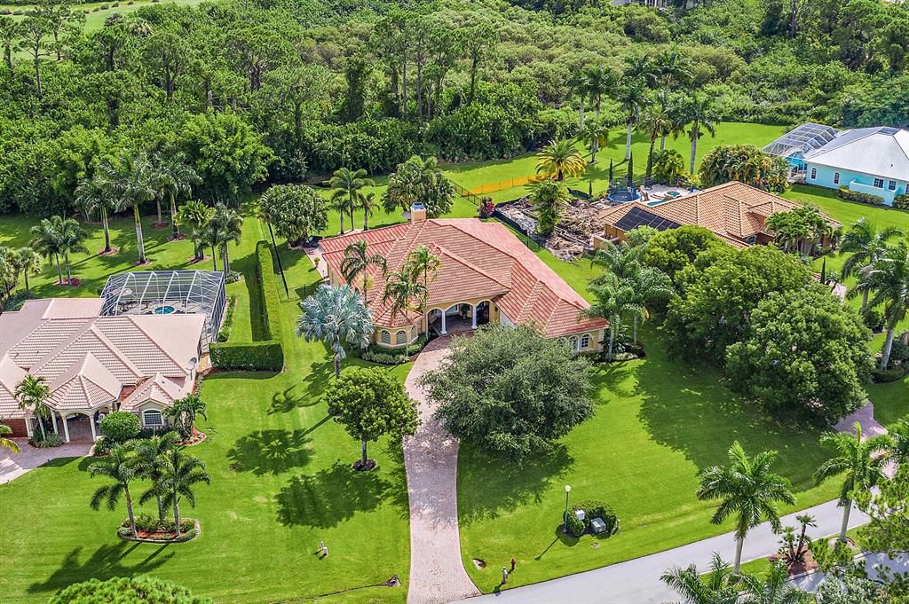 Photo of 10375 SW Whooping Crane Way Way, Palm City, FL 34990 (MLS # R10737681)