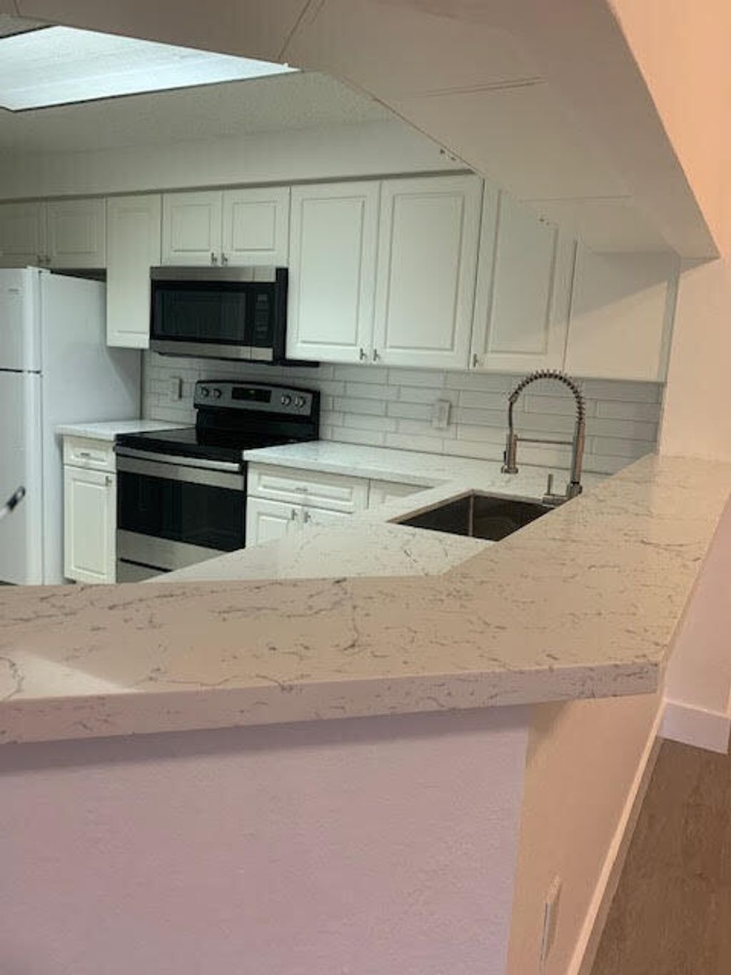 Photo of 3022 Alcazar Place #201, Palm Beach Gardens, FL 33410 (MLS # R10985114)