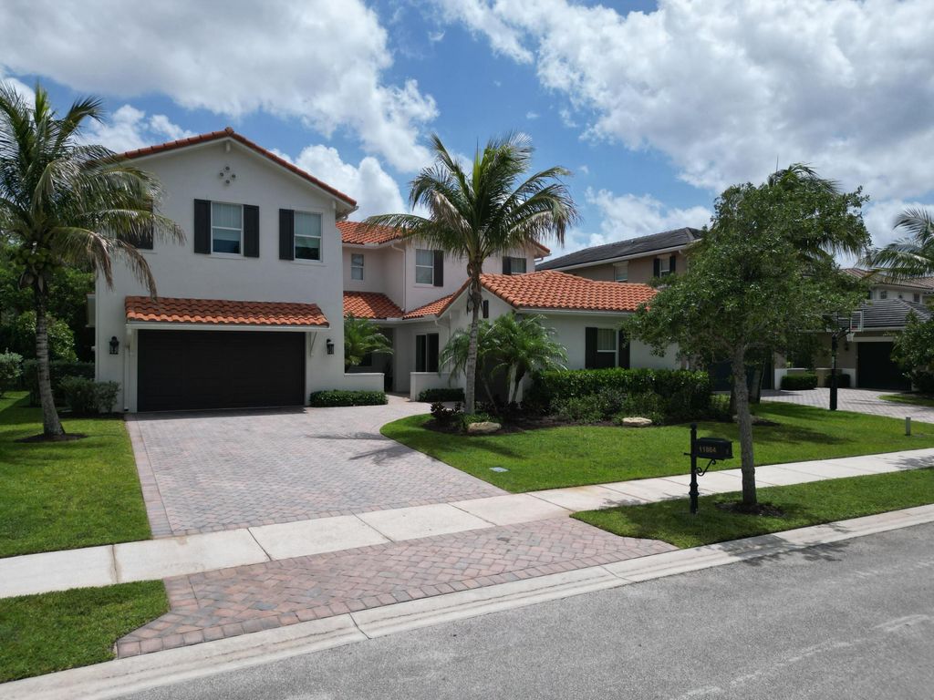 Photo of 11864 NW 79th Court, Parkland, FL 33076 (MLS # B26032461)