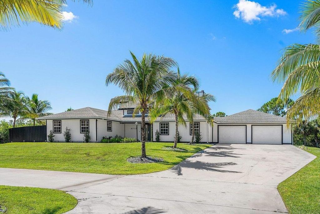 Photo of 8718 150 Th Court N, Palm Beach Gardens, FL 33418 (MLS # R10921986)