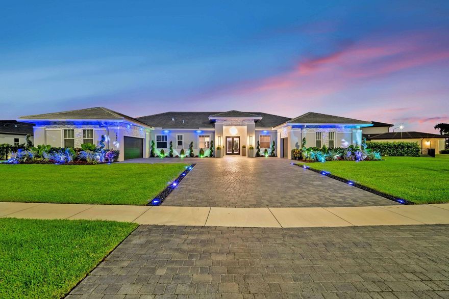 Largest 1 story smart waterfront home on 1/2 Acre lot in Sierra Ranches gated community, 7 bed,6 bath modern. Upgrades & finishes include complete smart home w/voice activation, kitchen, custom designed closets,Dekton countertops custom quartz counter, bar, built-in bottle wine fridge,Upgraded Electric blinds,home/voice activated, top of the line appliances, State of the art security system,infrared air purifiers,Full home entertainment sonos audio installed throughout home & in back patio w/intercom, Insulated smart garages w/refinished floors. Custom master closets, elegant wood like tile floors. Upgraded chandeliers & voice activated lighting throughout the interior & exterior of the home. Luxury landscaping with smart color changing lighting system. New construction Dec 2021. Must see. Largest 1 story smart home located corner lakefront 1/2 Acre lot on Lake in Sierra Ranches gated community. 7 bed,6 bath modern luxury home has the finest of finishes. Upgrades & finishes include complete smart home with voice activation,kitchen, custom designed closets,Dekton countertops custom quartz counter, bar, built-in bottle wine fridge, Upgraded Electric blinds throughout house/ voice activated, top of the line appliances, State of the art security system,infrared air purifiers,Full home entertainment sonos audio installed throughout home and in back patio with intercom,Insulated smart garages w/refinished floors. Custom master closets,  elegant wood like tile floors. 40k in upgraded chandeliers a & voice activated lighting throughout the interior & exterior of the home. 75k luxury landscaping with smart color changing lighting system. New construction completed Dec 2021. Live in one of the most luxurious desired gated communities in Davie, surrounded by the best schools in South Florida. This luxury home will exceed all expectations.