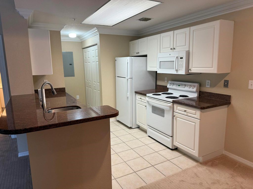 Photo of 2806 Veronia Drive #114, Palm Beach Gardens, FL 33410 (MLS # R11119125)
