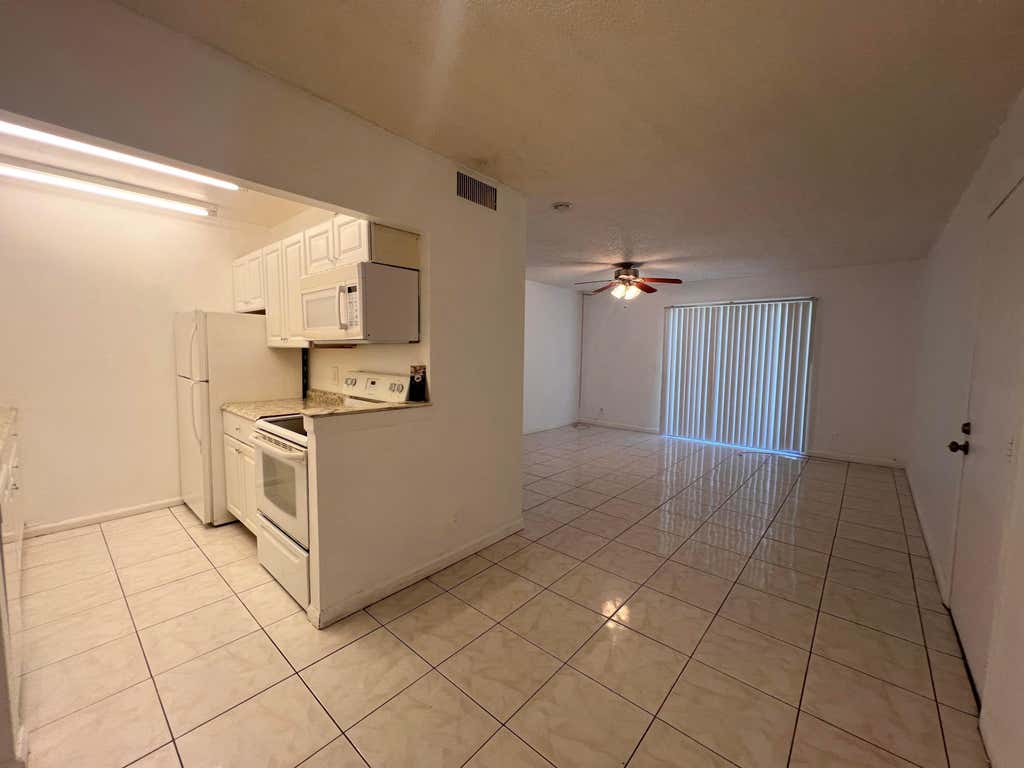 Photo of 1500 N CONGRESS Avenue #A5, West Palm Beach, FL 33401 (MLS # B26065737)