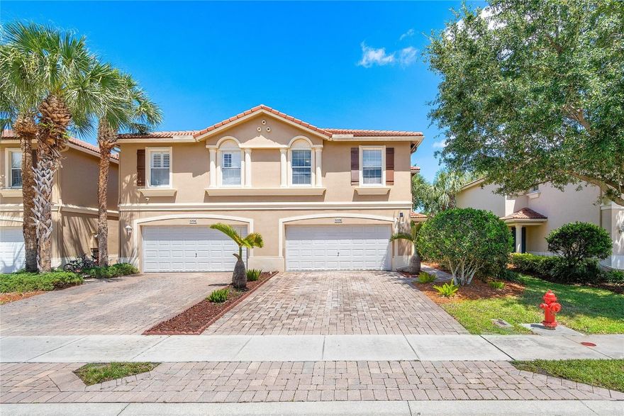 This 3 bed, 2.5 bath with a 2 car garage Verona palms townhome is NEWLY updated and ready for your arrival. This smart home features Motorized blinds, updated kitchen with stainless steel appliances, and a large pantry with pull-out drawers. Master bedroom has an extra large walk-in closet, and the bathroom features a walk-in shower/spa-tub combo. Spacious laundry room located on second floor, and you have the comfort of an oversized, screened in back patio with a beautiful view of the lush landscaping. Enjoy full hurricane shutter protection throughout the home. and the neighborhood  offers fully fiber-optic internet availability. Verona Palms amenities include gated entrance, community pool, & playground. Conveniently located near highways, schools, shopping, and dining!!!