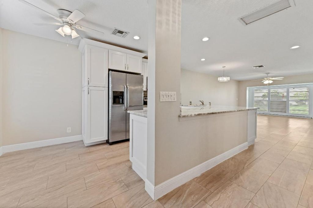 Photo of 13745 Flora Place #B, Delray Beach, FL 33484 (MLS # R11158426)