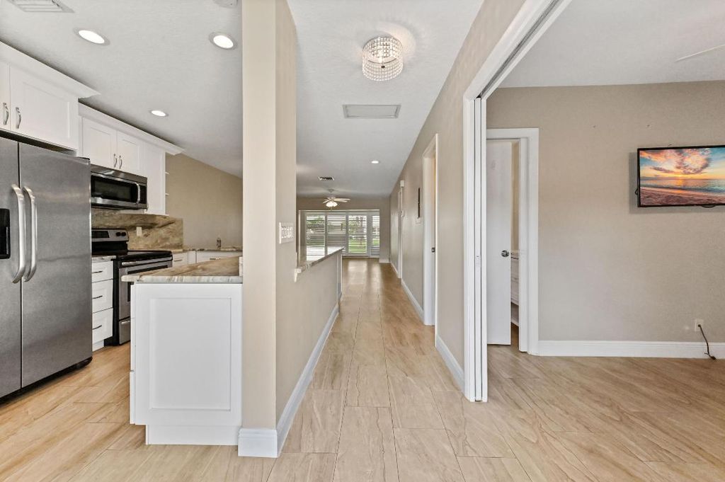 Photo of 13745 Flora Place #B, Delray Beach, FL 33484 (MLS # R11158426)