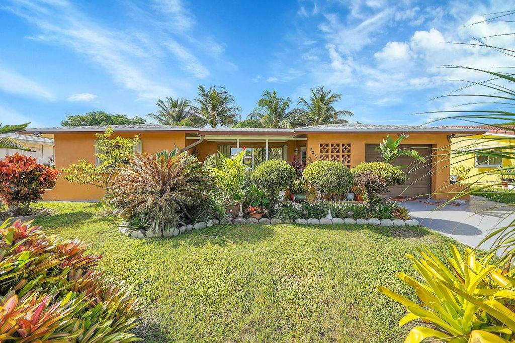 Photo of 5303 NW 50th Avenue, Tamarac, FL 33319 (MLS # R11146703)