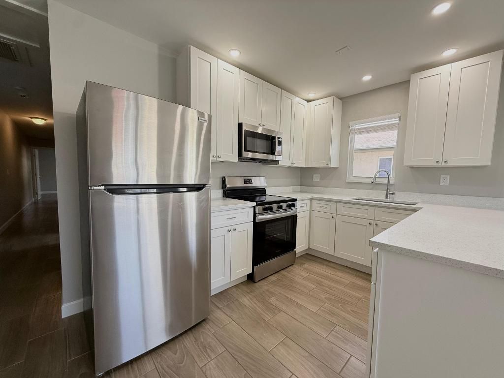 Photo of 1001 W 9th Street #B, Riviera Beach, FL 33404 (MLS # R11149343)