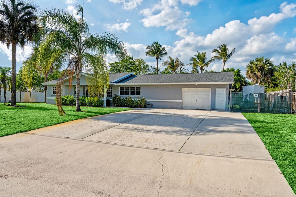 Photo of 6537 Monmouth Road, West Palm Beach, FL 33413 (MLS # B26024155)