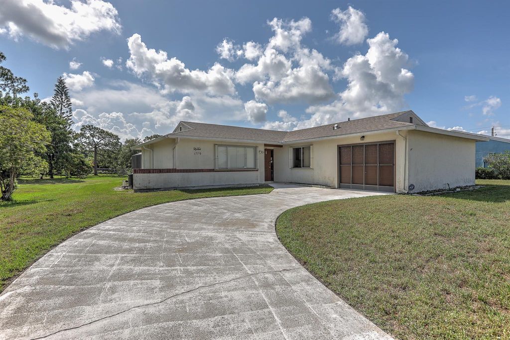 Photo of 1779 SE Burgundy Lane, Port Saint Lucie, FL 34952 (MLS # R11094885)