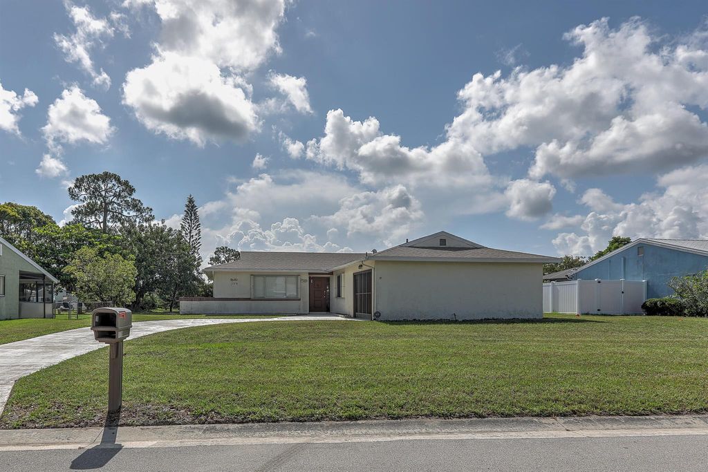Photo of 1779 SE Burgundy Lane, Port Saint Lucie, FL 34952 (MLS # R11094885)