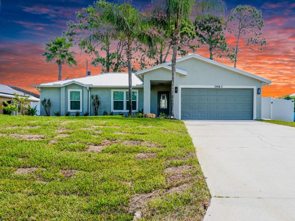 Photo of 3983 SW Helmlinger Street, Port Saint Lucie, FL 34953 (MLS # R11106396)