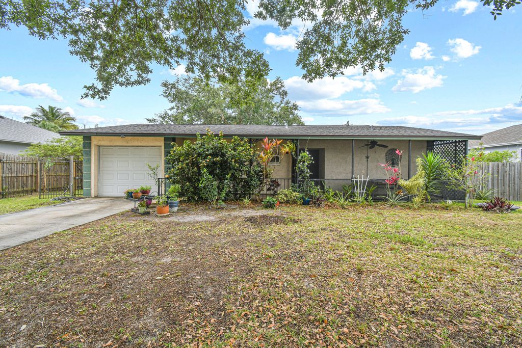 Photo of 2326 SW Madrid Road, Port Saint Lucie, FL 34953 (MLS # R10792855)