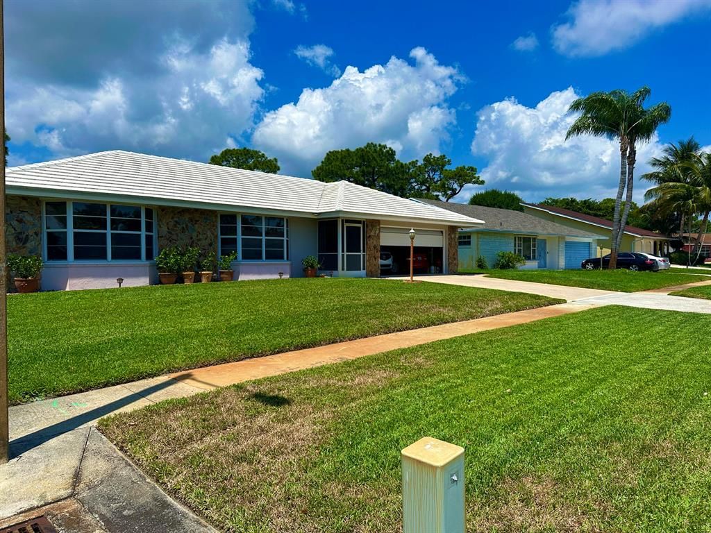 Photo of 111 W Timber Run W, Riviera Beach, FL 33407 (MLS # R10882298)