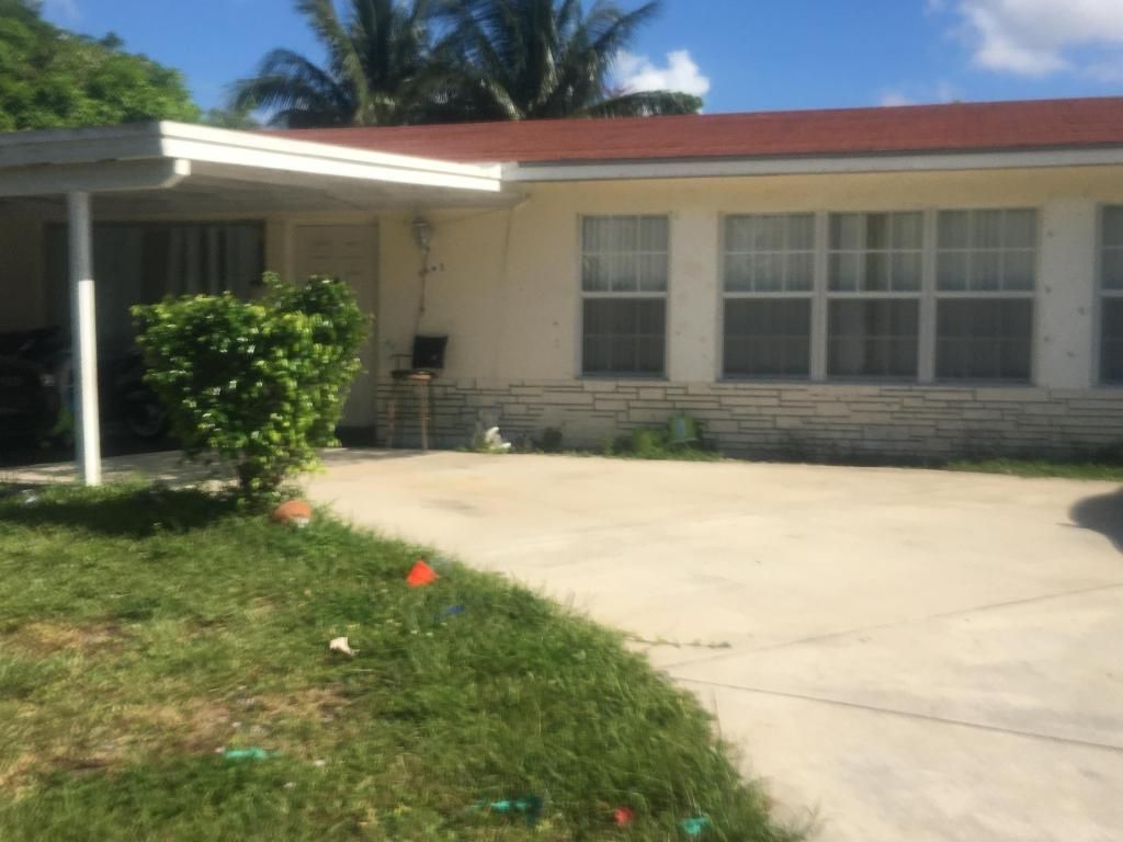 Photo of 1643 44th Street, West Palm Beach, FL 33407 (MLS # R11152733)