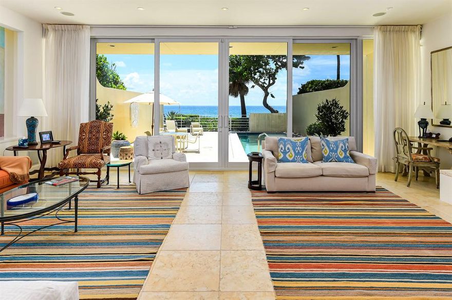 Oceanfront Townhouse 9 at the Sloan's Curve Residences. 3 Bedrooms 4.5 Baths, Staircase to the Beach, Lounge at your private pool (27.5'x10') in front of the tropical blue Atlantic. Residence offers ocean views from all main rooms. Very large living room, dining area. It also features a huge master bedroom facing the ocean with fireplace, large balcony, his & hers bathrooms, and large closets. Plus two additional bedrooms & baths.