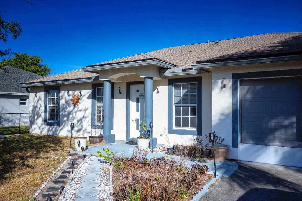 Photo of 707 NW Nw Floresta Dr, Port Saint Lucie, FL 34983 (MLS # R11134194)