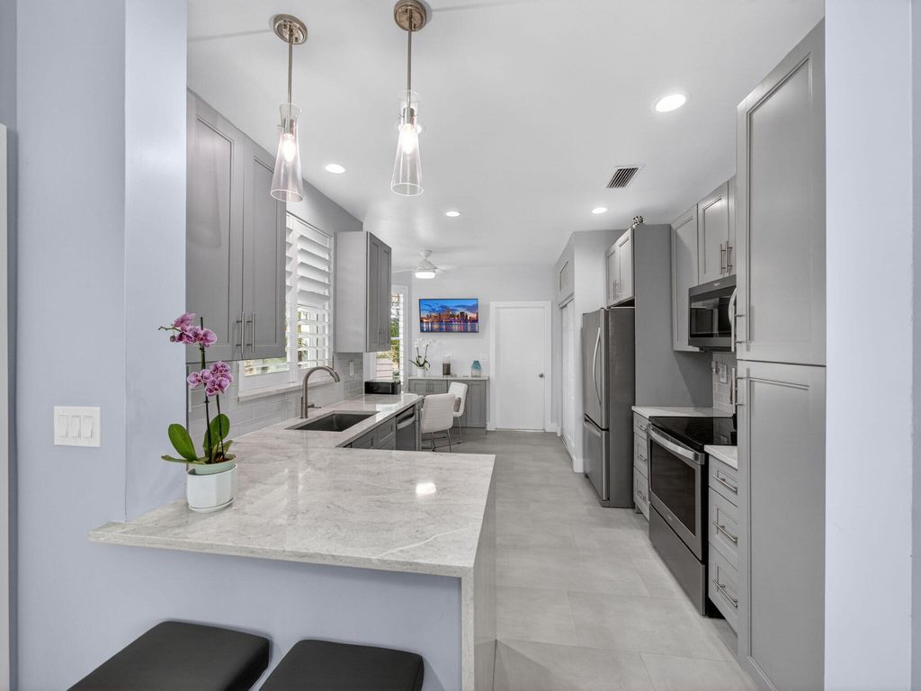 Photo of 2028 Mainsail Circle, Jupiter, FL 33477 (MLS # R11165636)