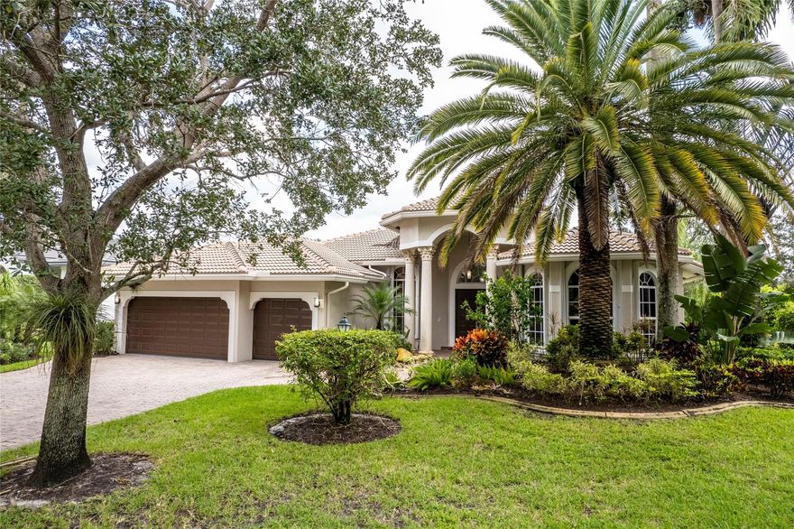 Wow! Just what you've been waiting for - a gorgeous, lakefront home in Fox Ridge w/more than $100K in recent upgrades! These upgrades include: BRAND NEW ROOF & gutters; full hurricane protection w/some IMPACT windows/doors; beautifully updated kitchen with wood cabinets, granite countertops & stainless steel appliances; interior recently painted; new, modern family room tv console & decorative shelving; designer light fixtures; resurfaced pool; child safety pool gate; "Pebble Tec" garage flooring and more! This home also features volume ceilings, beautiful architectural details throughout, a triple split bedroom plan and stunning water views! Fox Ridge offers a 24-hour manned guard gate, tennis courts, volleyball court & playground w/low HOA fees. Walking distance to all A-rated schools!