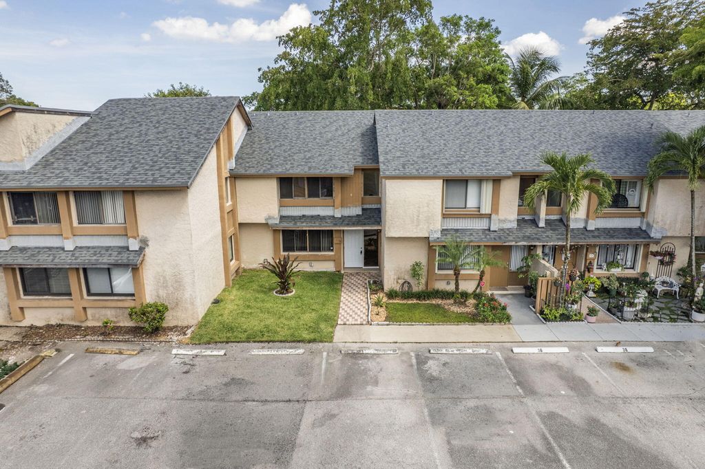 Photo of 32 Wimbledon Lake #221, Plantation, FL 33324 (MLS # B26027794)