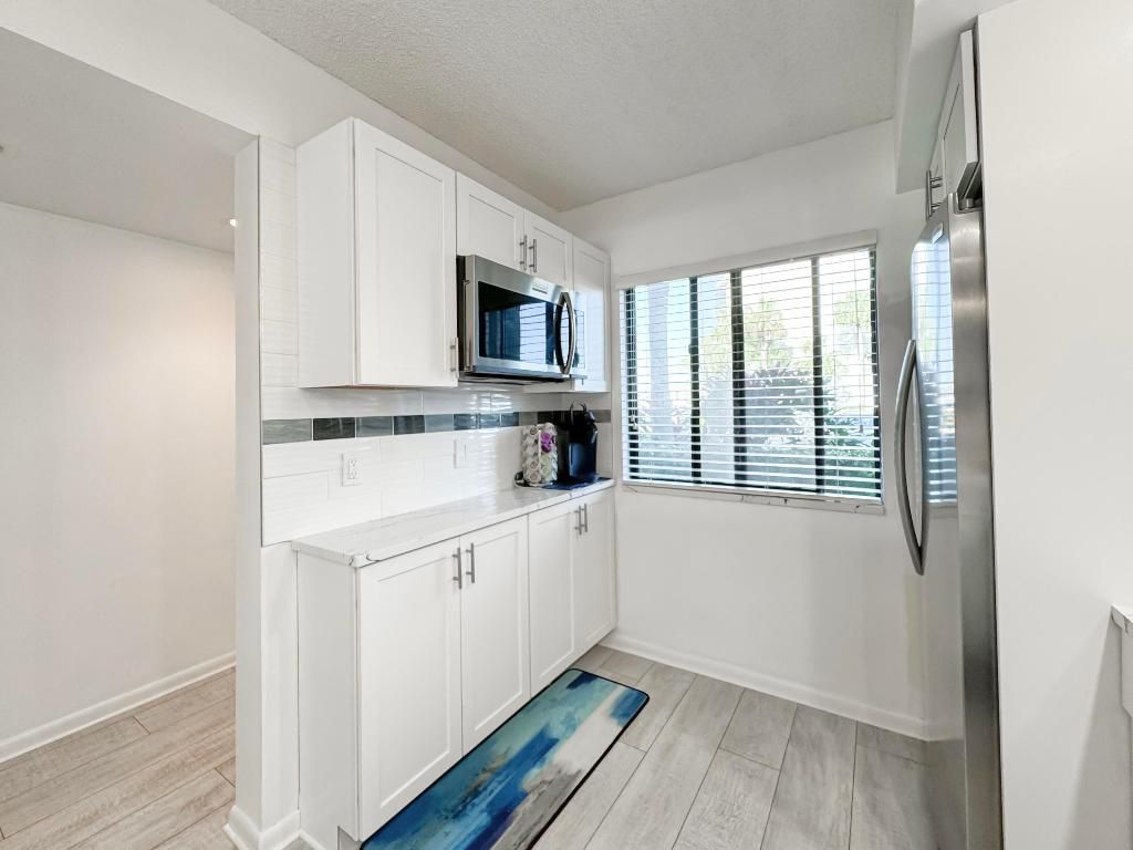 Photo of 1001 Seafarer Circle #102, Jupiter, FL 33477 (MLS # R10980178)