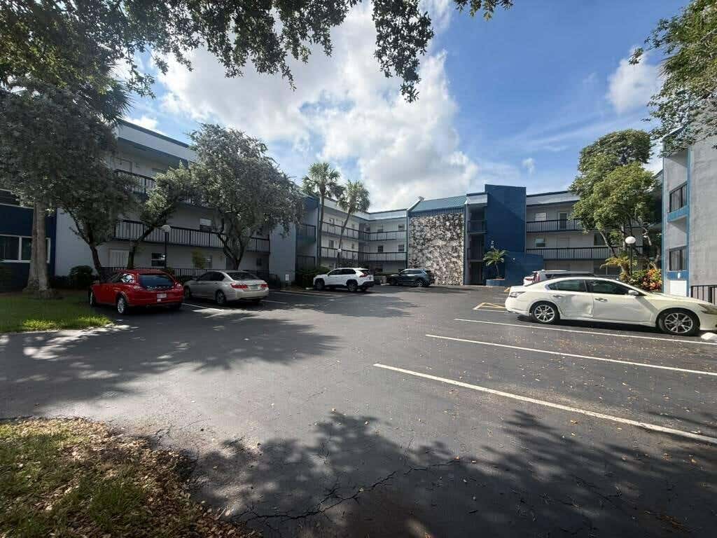 Photo of 3210 Holiday Springs Boulevard #2-103, Margate, FL 33063 (MLS # B26047557)
