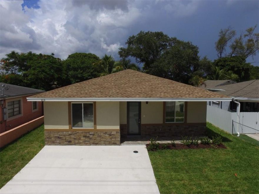 This beautiful new construction home is 1892 Sf. The house features four bedrooms and two full bathrooms, a large kitchen and two car driveway. This home comes with Smart home ready features:  smart irrigation system and wired for ten security cameras. This home has privacy and energy efficient impact windows and impact glass exterior doors! The home also features vaulted ceilings and large format tiles throughout. This home is under construction and the estimated date of completion is 8/31/2022.