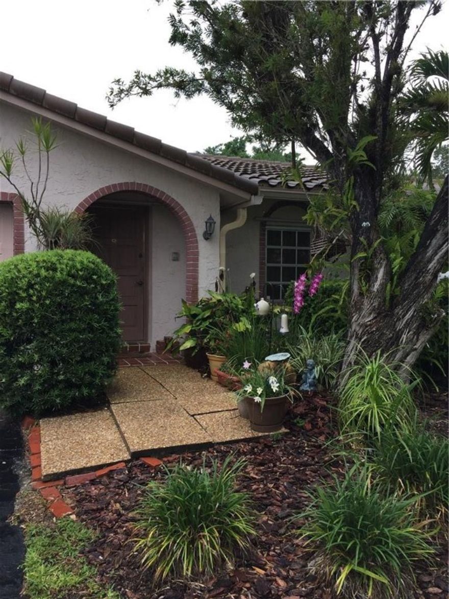 READY TO MOVE IN! UPDATED KITCHEN WITH MOVABLE ISLAND, 3 DOOR FRIDGE, WOOD FLOORS IN ENTRY, KITCHEN, FAMILY ROOM & EAT IN AREA. LARGE MASTER W/PRIVATE SUITE BATHROOM, LARGE WALK IN CLOSET. NEW UPDATED BATHROOMS W/DOUBLE SINKS, PART OF FAMILY ROOM CAN BE TURNED INTO 5TH BEDROOM (HAS CLOSET) ENJOY THE OVERSIZED POOL W/PAVER PATIOS, LARGE SCREENED IN AREA AS WELL! HURRICANE SHUTTERS! TILE ROOF & HOT WATER HEATER ONLY 5 YR OLD, A/C 1 YR OLD.  THANK YOU FOR SHOWING