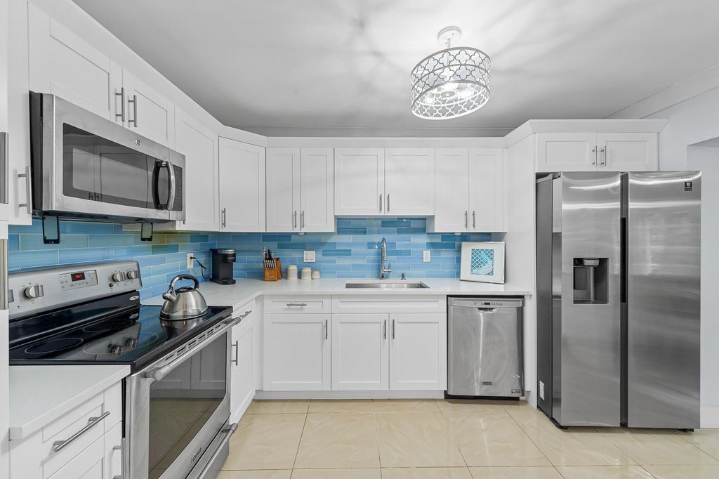 Photo of 6548 Via Regina, Boca Raton, FL 33433 (MLS # R11139486)
