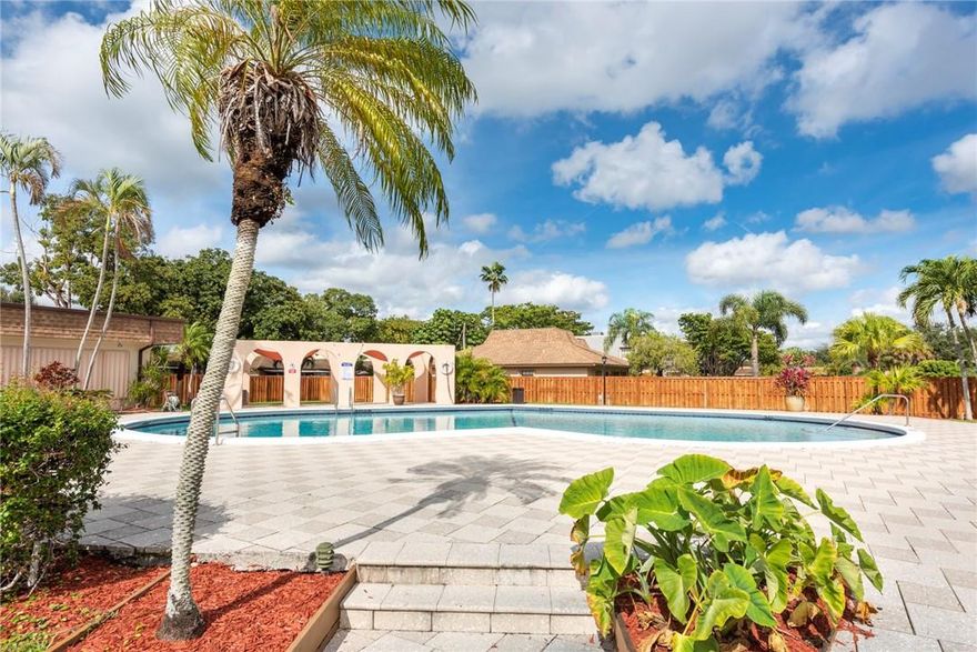 **Beautiful open spacious townhome Approximately 1490sf. Huge remodeled kitchen--granite counter tops and long cabinets. Laminated wood floors on first floor living room and hallway. New carpet upstairs in bedrooms. Big laundry room first floor with full size washer and dryer. Half bathroom also on first floor. 2 patios front and back freshly painted. Both patios fenced. Bathrooms remodeled. Spacious master bedroom and large master bathroom dual sinks and shower. NO RESERVES. pet ok. all ages ok. Close to Nova Southeastern University, Broward College, shopping center, restaurants, home depot, Whole foods, Trader Joe's, Starbucks, and more. Community pool. 2 assigned parking spots. Freshly painted interior. Great area!