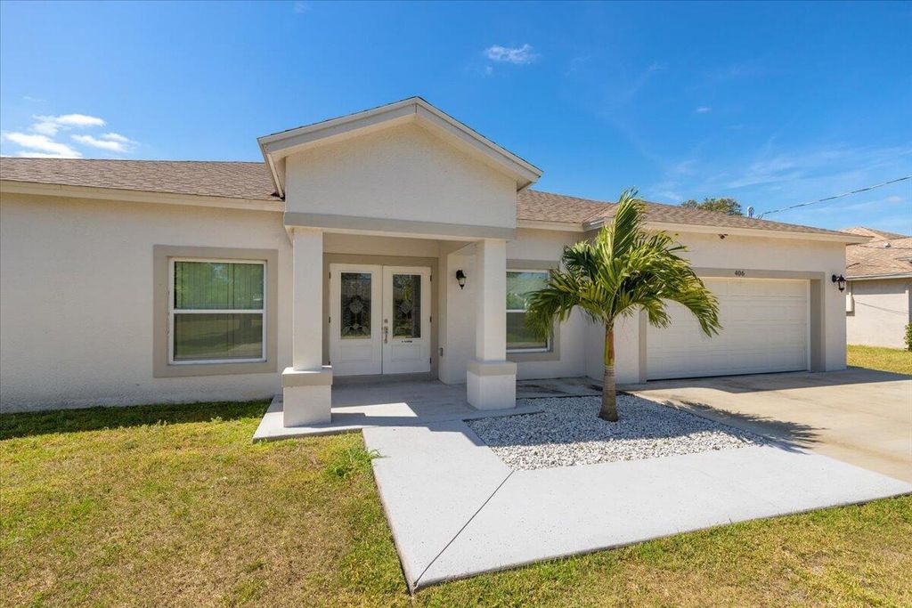 Photo of 406 SW Ridgecrest Drive, Port Saint Lucie, FL 34953 (MLS # R10980200)