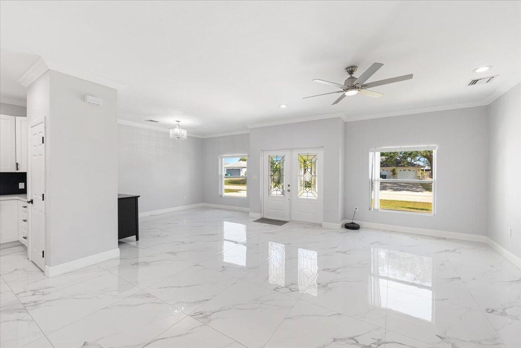 Photo of 406 SW Ridgecrest Drive, Port Saint Lucie, FL 34953 (MLS # R10980200)