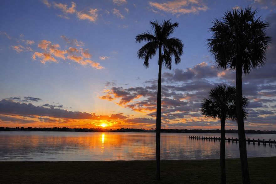 Stunning Intracoastal views from this beautifully updated 2BR/2BA condo on one of the widest sections of the waterway in Hypoluxo, overlooking prestigious Manalapan. Southeast exposure delivers breathtaking sunrises and shimmering moonlit evenings over the water. Features include hurricane impact windows (2024), upscale LG appliances, Hunter Douglas shades (one motorized), 3 new ceiling fans, and a full in-unit laundry room. The primary suite offers a fully renovated bath with frameless glass shower and elegant "Ora Beach" tile. Milestone inspection and reserve study completed. Enjoy a unique waterfront lifestyle with a tiki hut over the Intracoastal by the pool—perfect for relaxing and taking in the views. Association improvements include new front doors and lobby enhancements.