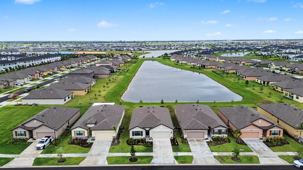 Photo of 9868 SW Triton Way, Port Saint Lucie, FL 34987 (MLS # B26026113)