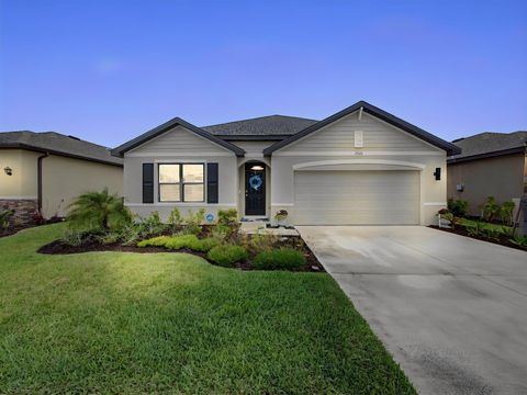 Photo of 9868 SW Triton Way, Port Saint Lucie, FL 34987 (MLS # B26026113)