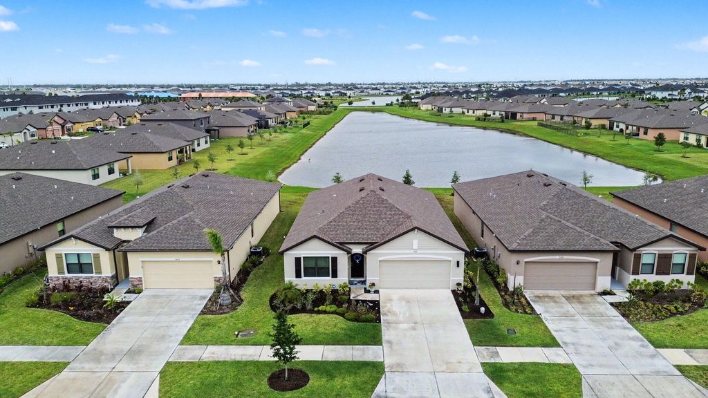 Photo of 9868 SW Triton Way, Port Saint Lucie, FL 34987 (MLS # B26026113)