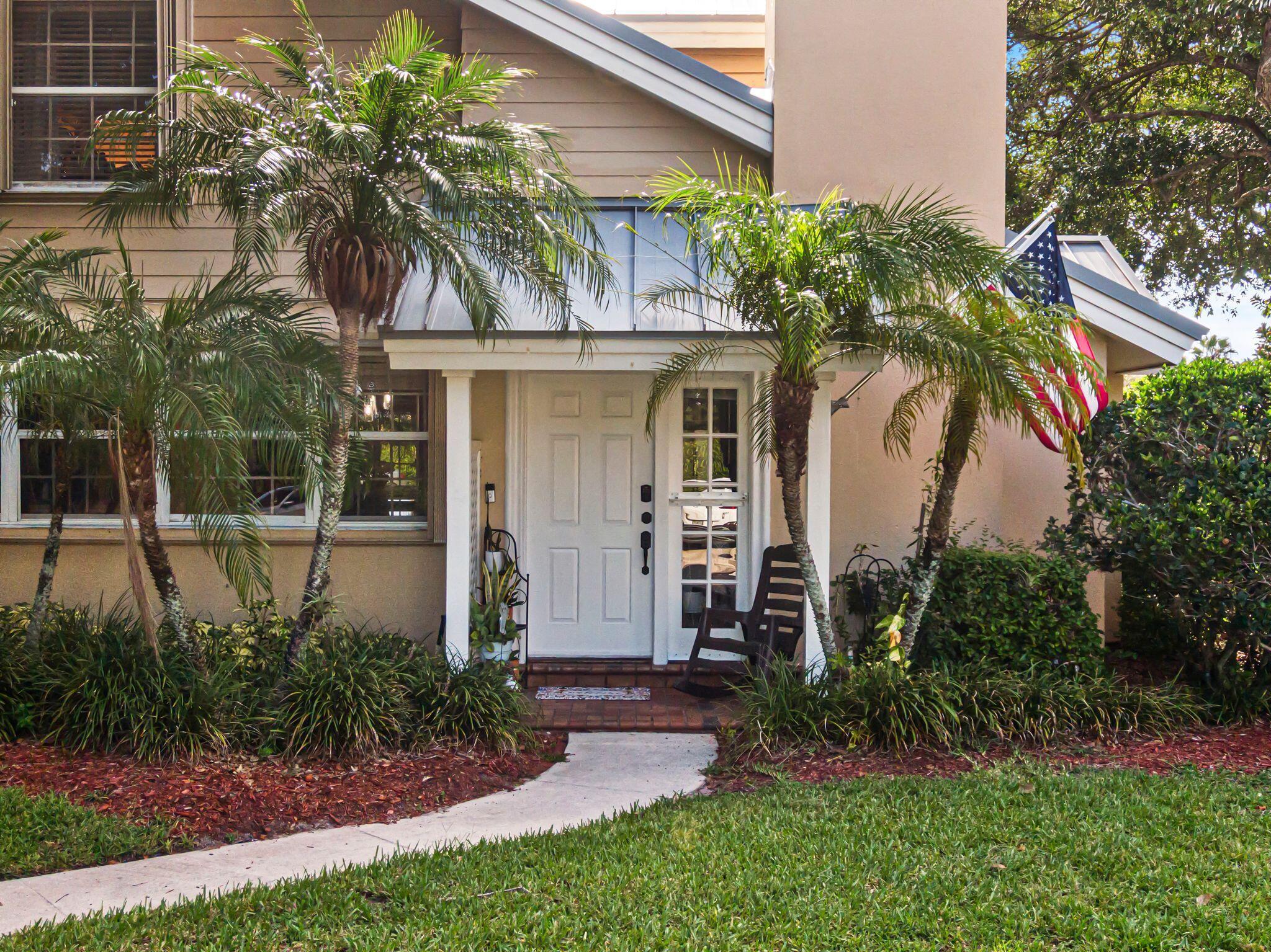 Impeccably updated 3-bedroom, 2-bath townhouse featuring a durable metal roof (2019), new AC unit (2020), and water heater (2024). The beautifully redesigned kitchen showcases custom KraftMaid cabinetry, granite countertops, a spacious island, farmhouse sink, and modern appliances--perfect for entertaining. Both bathrooms have been tastefully renovated (2023 & 2025) with quality finishes. Additional upgrades include hardwood stairs, elegant ceramic tile flooring, accordion storm shutters, and a new washer/dryer. HOA ($545/mo) includes roof and exterior maintenance, 24/7 gated security, landscaping, pool service, and more. Stylish, turnkey, and ready to welcome you home.