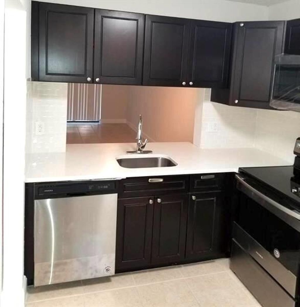 Photo of 1230 S Military Trail #2014, Deerfield Beach, FL 33442 (MLS # B26032611)