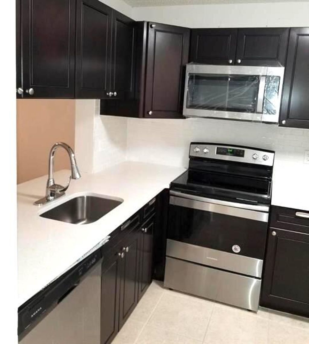 Photo of 1230 S Military Trail #2014, Deerfield Beach, FL 33442 (MLS # B26032611)