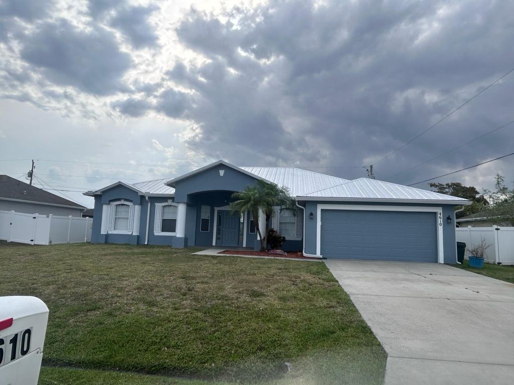 Photo of 4610 SW Pearl Street, Port Saint Lucie, FL 34953 (MLS # R10975653)